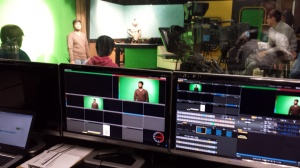 World Seminar students shoot a segment called the World Report in the PNN Studio.